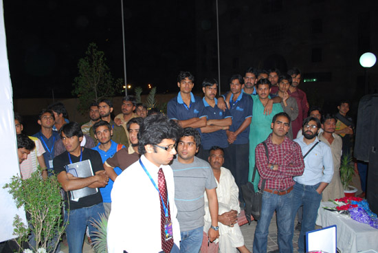 Students throng the prize distribution ceremony venue to cach a glimpse of Misbah ul Haq